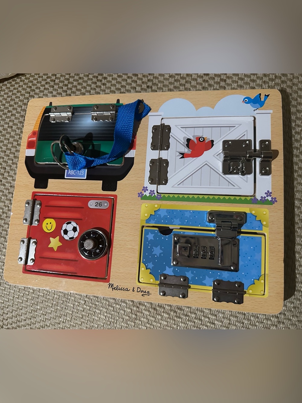 Melissa & Doug Lock & Latch Board - Blue, Yellow, Red, White